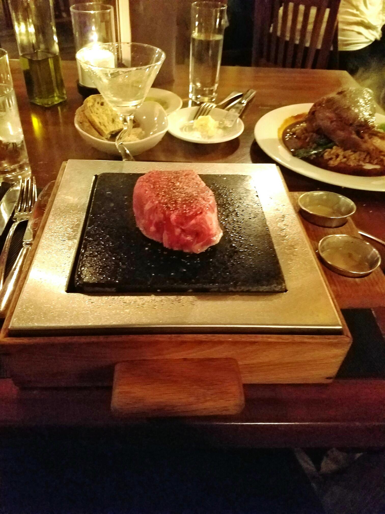Steak on a Stone ($33.50) is a filet mignon served on a hot stone, which allows each diner to cook it to their desired level of doneness.