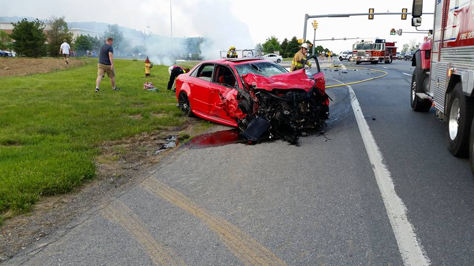 The front of a car involved in an accident near one of the entrances to the Promenade Shops at Saucon Valley Friday is shown smashed in this photo shared by rescuer Roger Counterman.