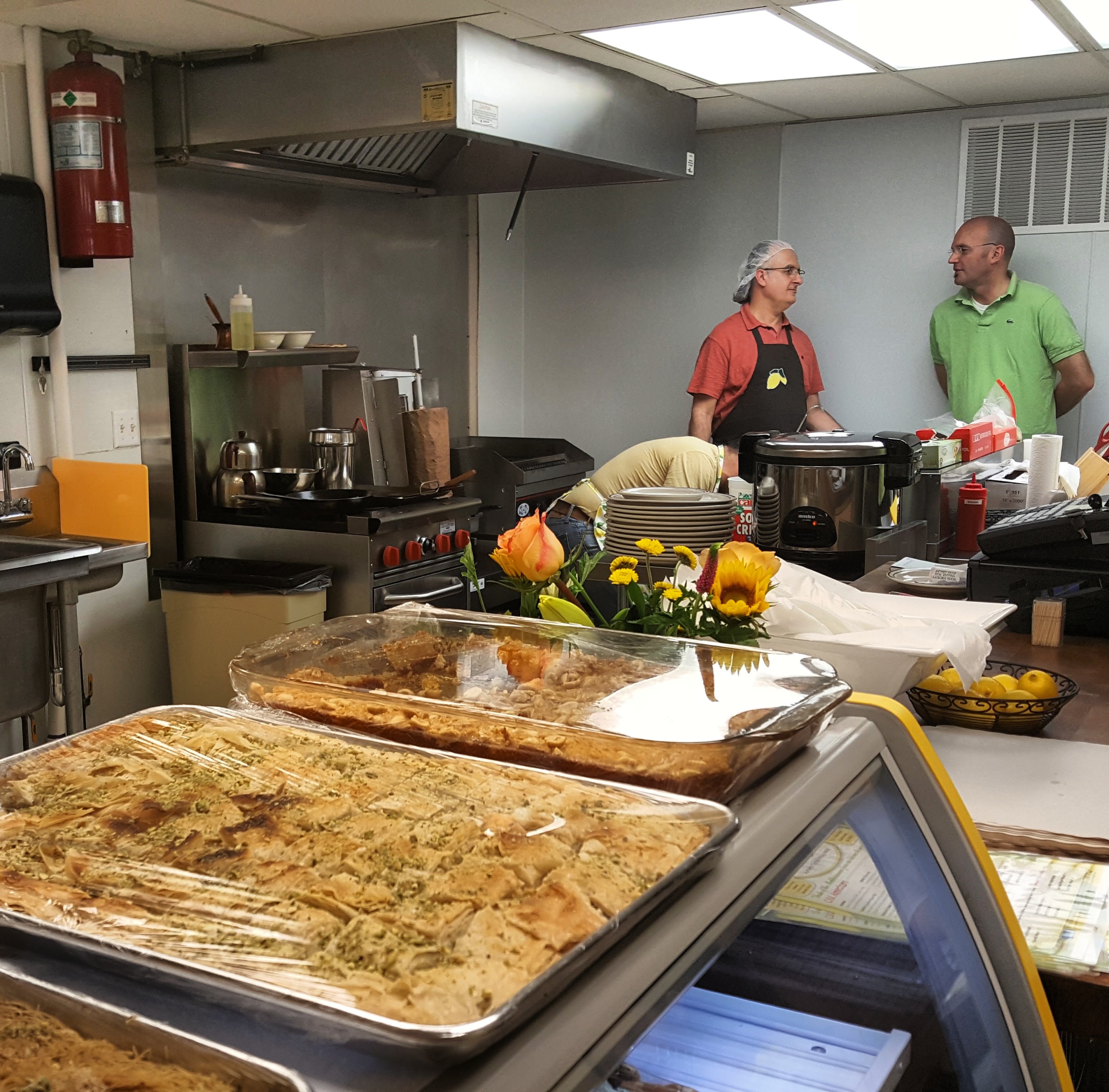The kitchen at Limon Authentic Turkish Kebap House is filled with family members on the day of the restaurant's soft opening.