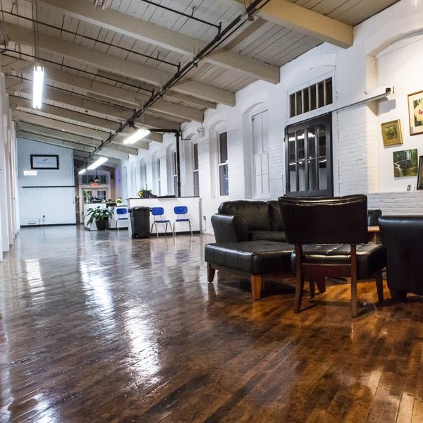 The studio is housed inside a restored former textile mill.