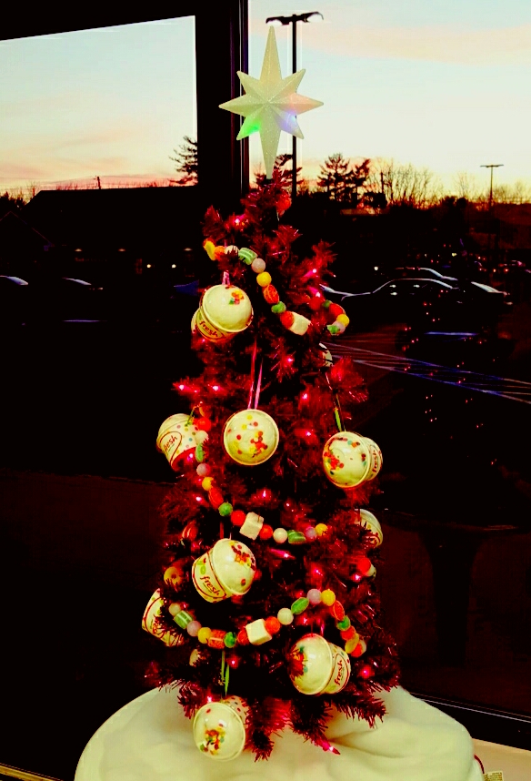 A Christmas tree decorated with froyo ornaments greets visitors to YoFresh Yogurt Cafe in Hellertown.
