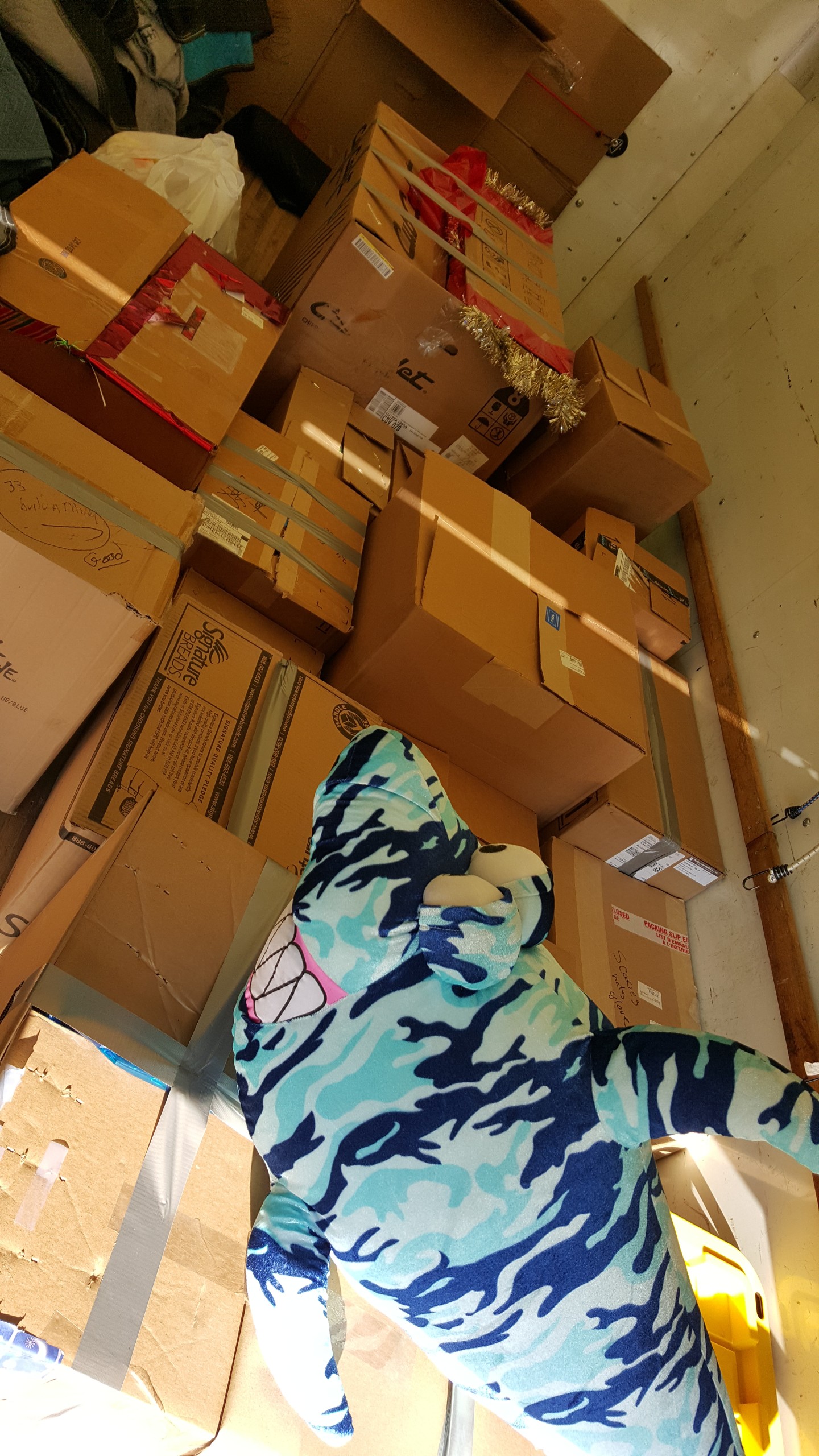 The floor of a 16-foot box truck was filled with boxes of toys donated for Toys for Tots.