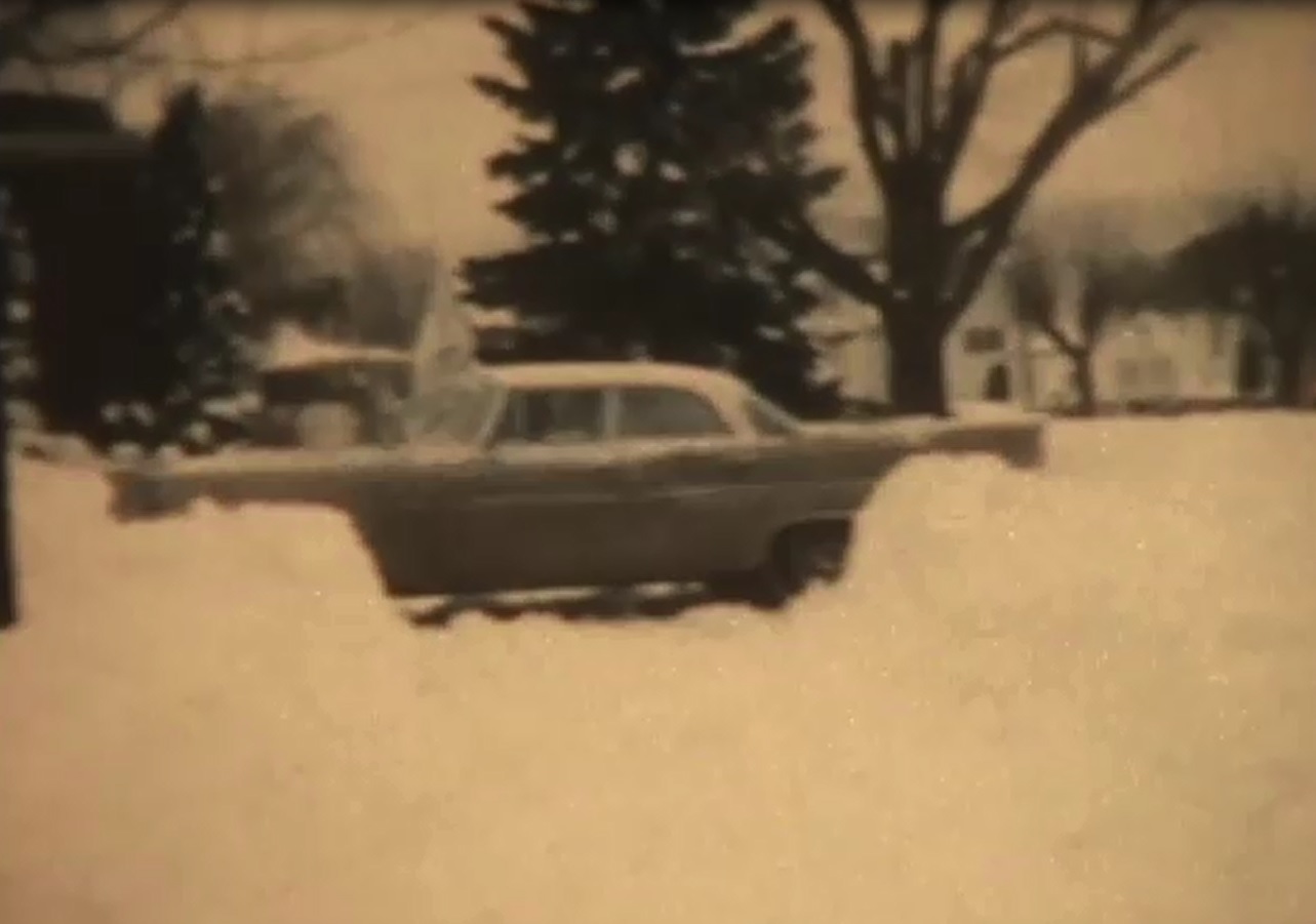 A still from the 1961 home movie by Dr. Filipek shows a car practically buried by heavy snow in Hellertown.