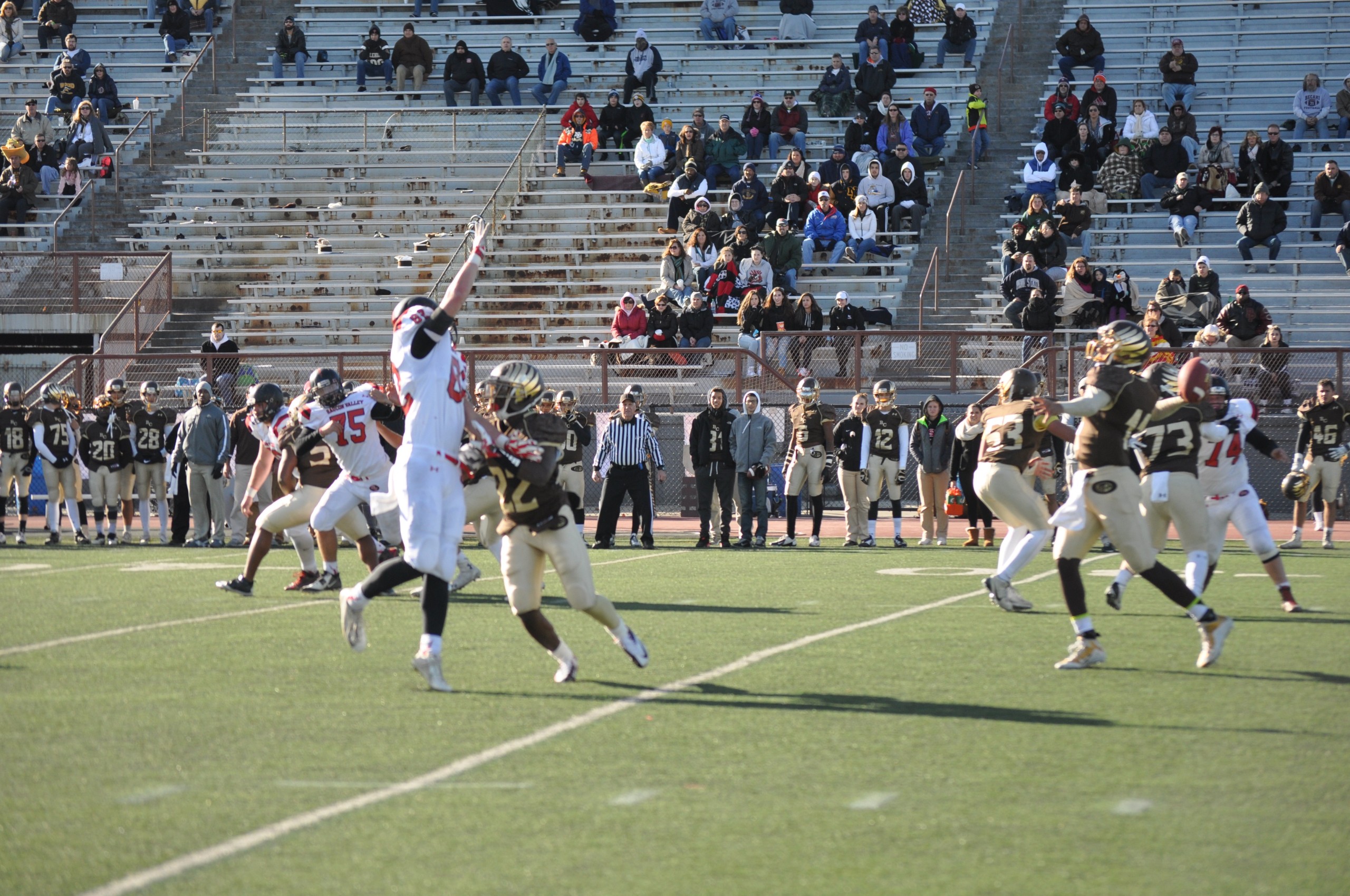 BECA quarterback Julian Spigner trying to complete a pass