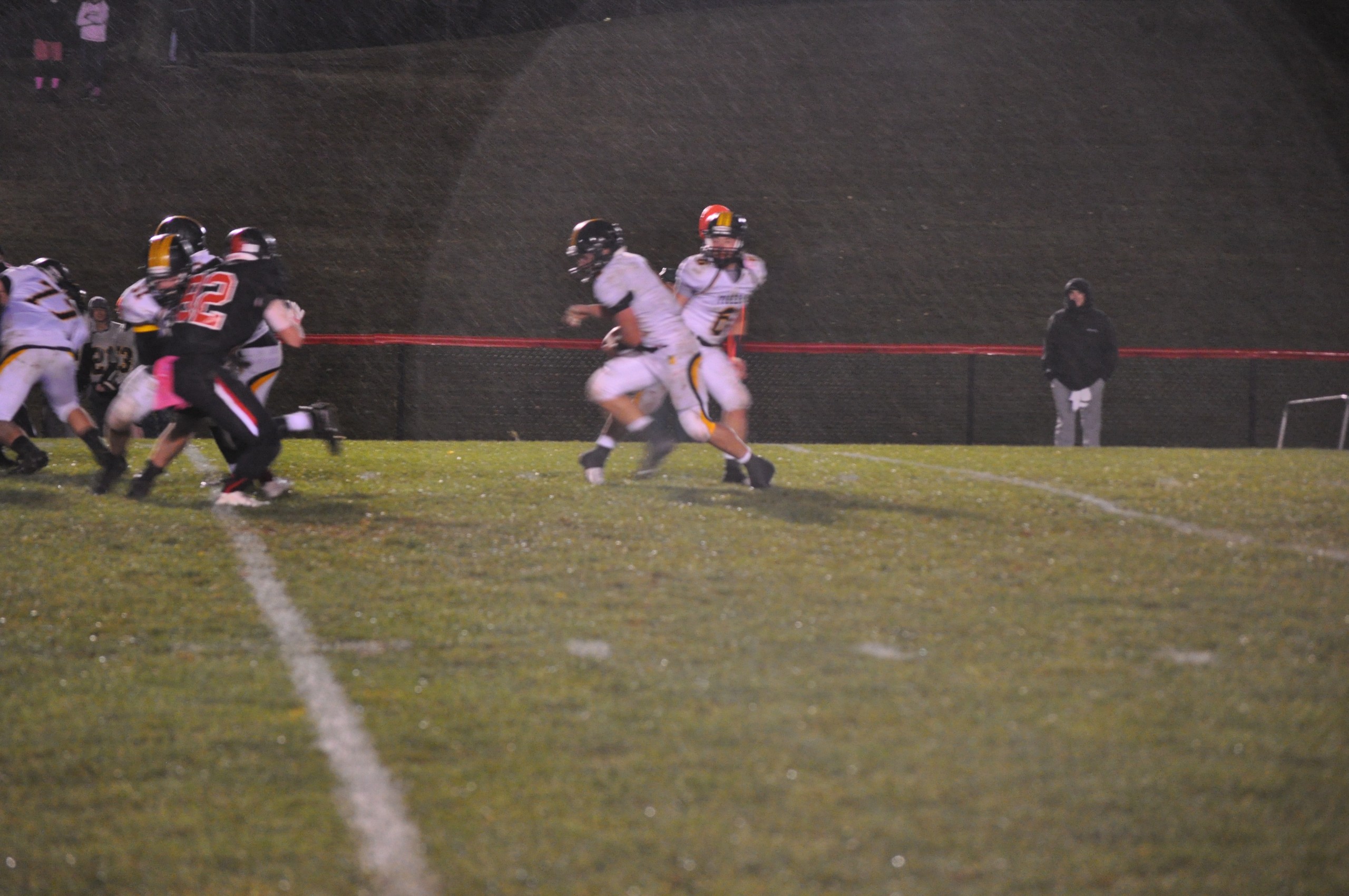 Northwestern's Dylan Snyder handing off to Harry Hall