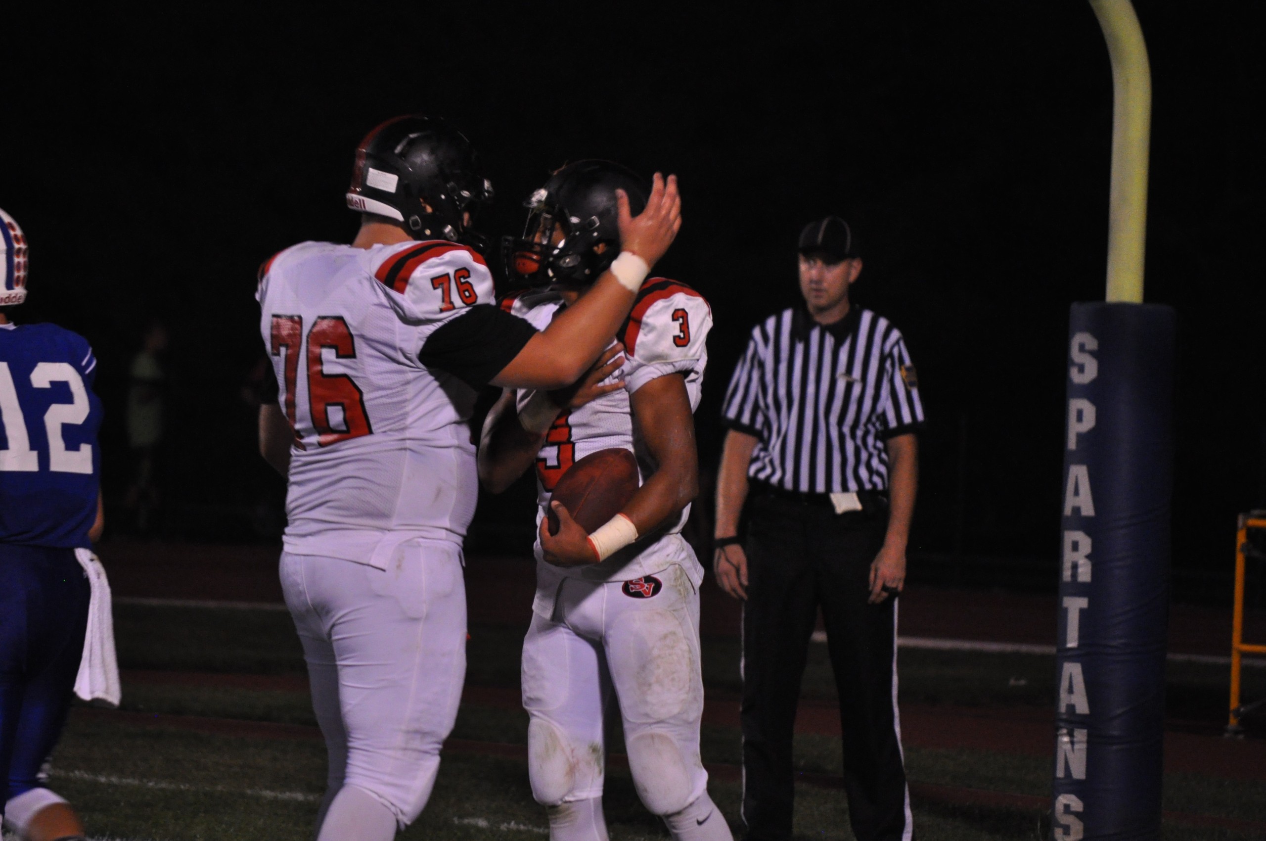 King Kong Cody congratulates Evan Culver on one of his three touchdowns