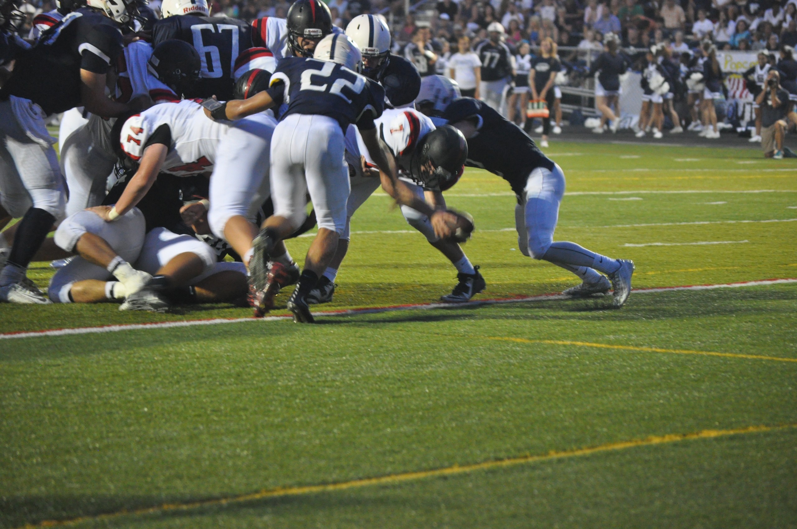 Saucon QB Zach Thatcher reaches the ball across the goalline for a touchdown