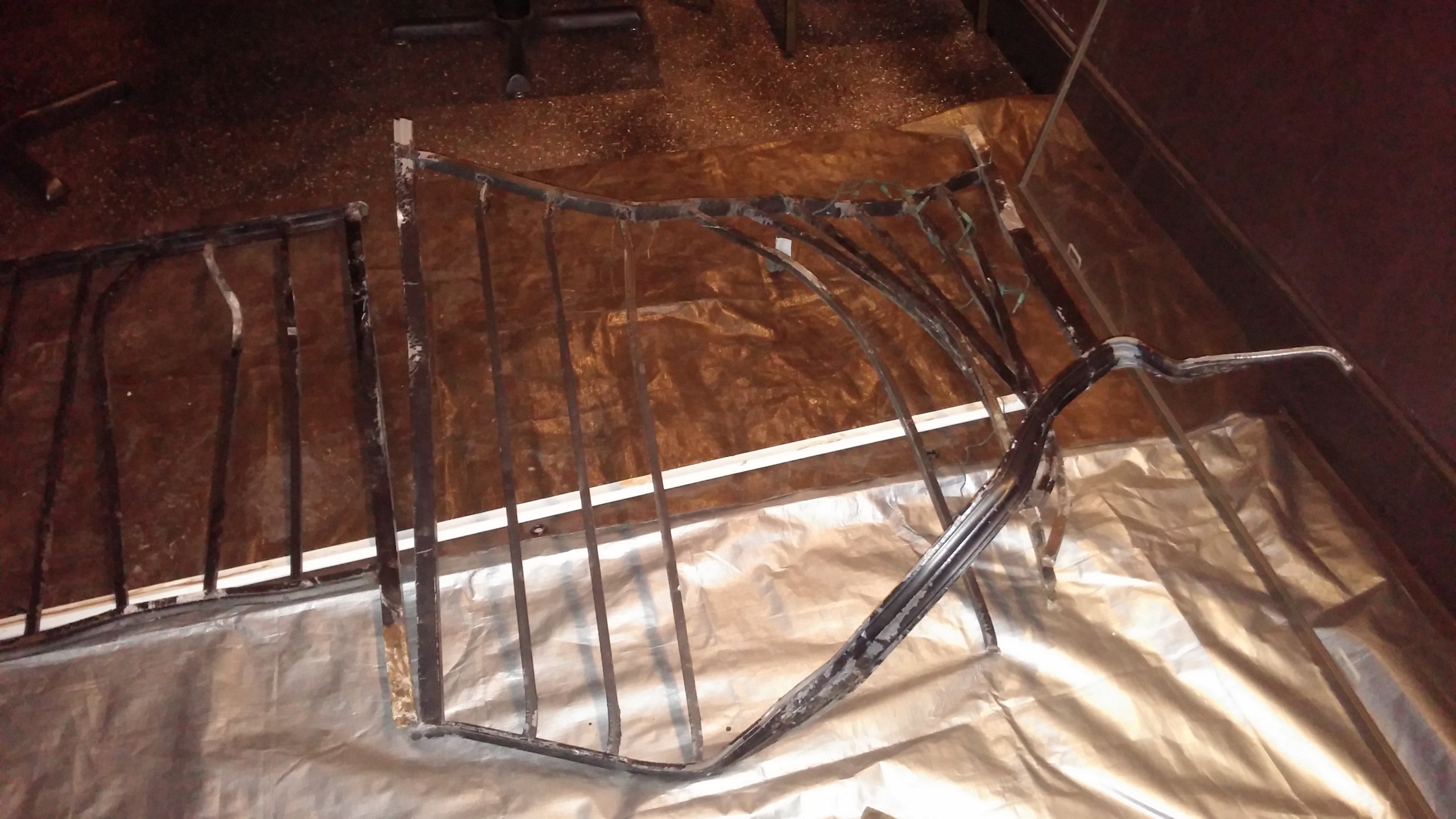 A metal railing that was part of the front steps to Sagra Bistro was bent by the impact of the crash.