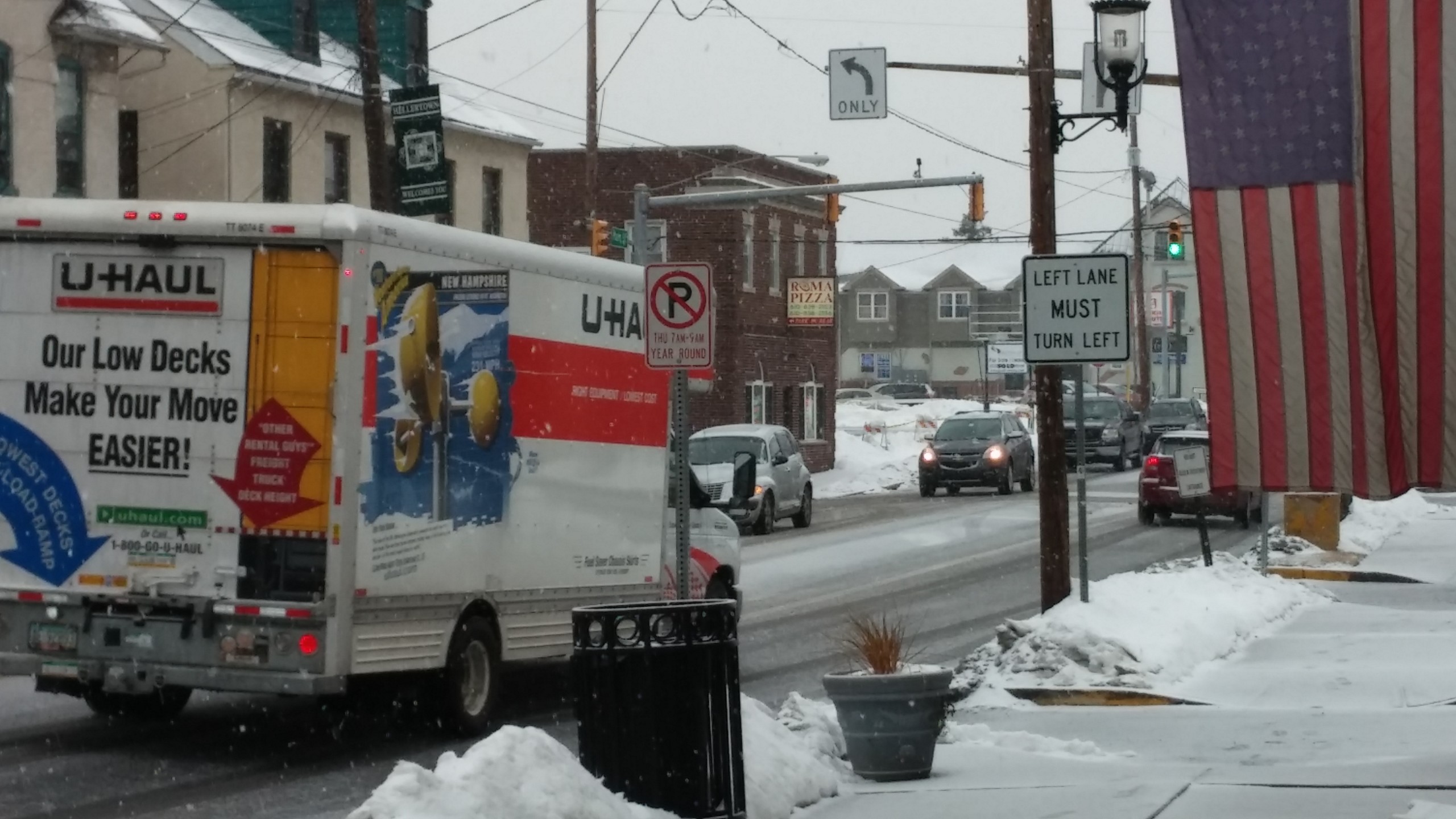 Traffic moves along Main Street in Hellertown as sleet falls on Tuesday.
