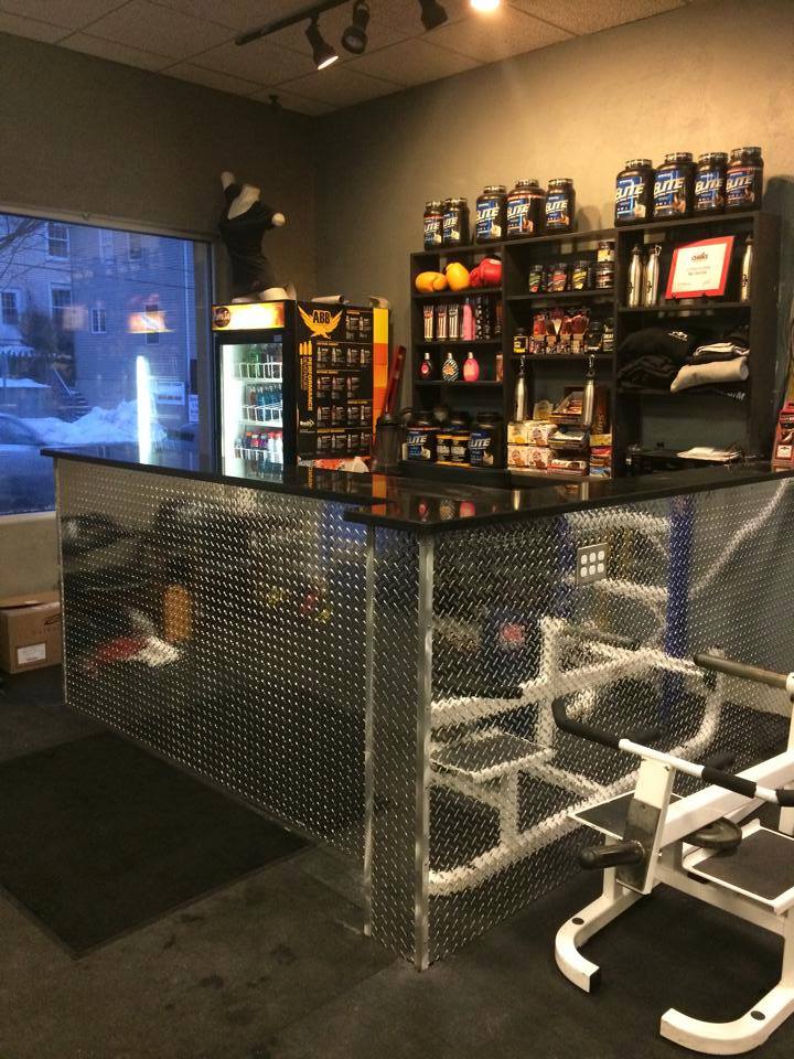 The front reception area at Main Street Gym in Hellertown has been given a sleek-looking industrial-style makeover, with the addition of a custom diamond-plate and black granite countertop. The floor in the weight room has also been replaced.