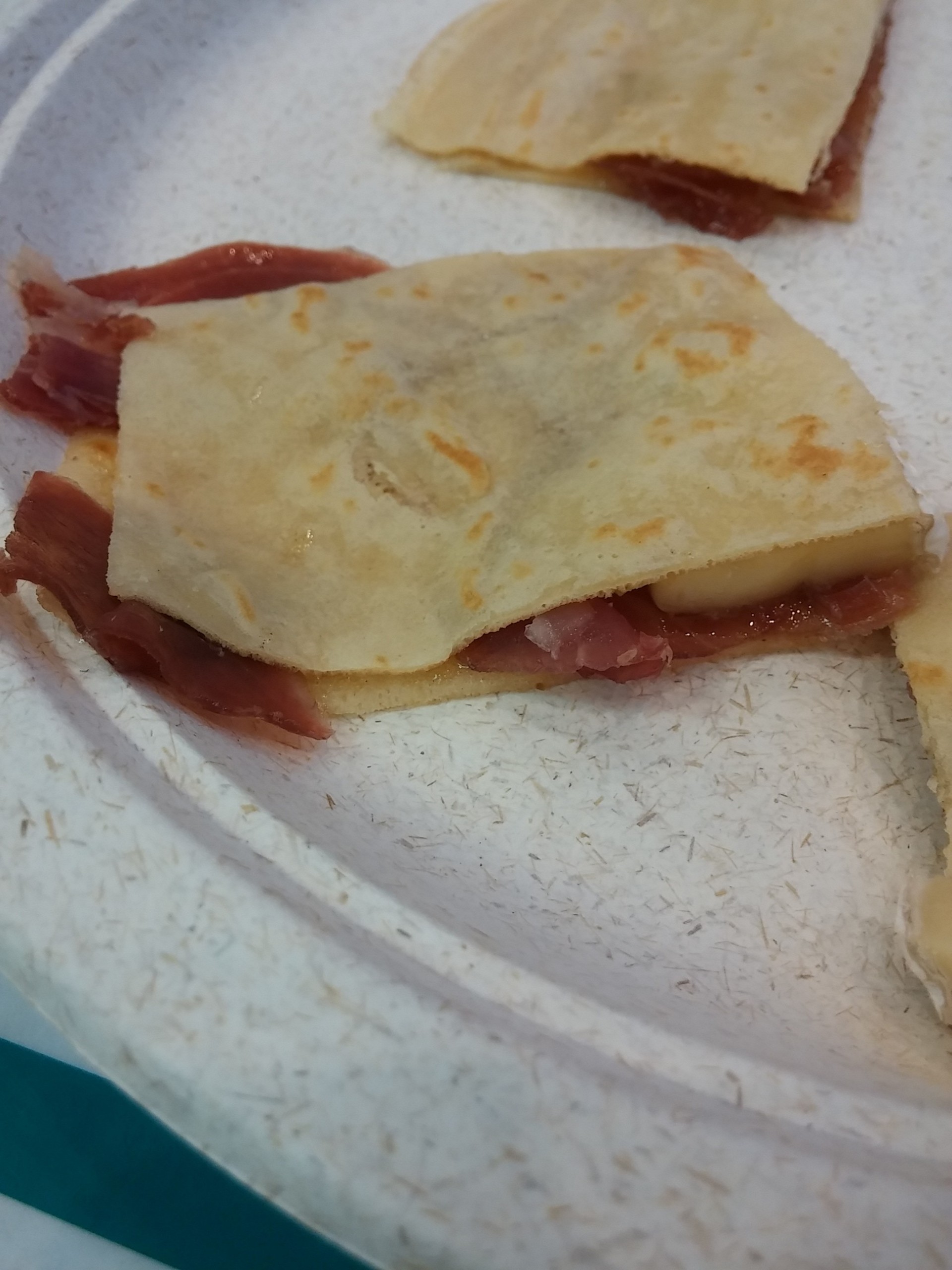 A sweet and savory crepe prepared with prosciutto, brie and fig preserves.