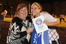Lauren Binn and mom Donna celebrate her soccer success.