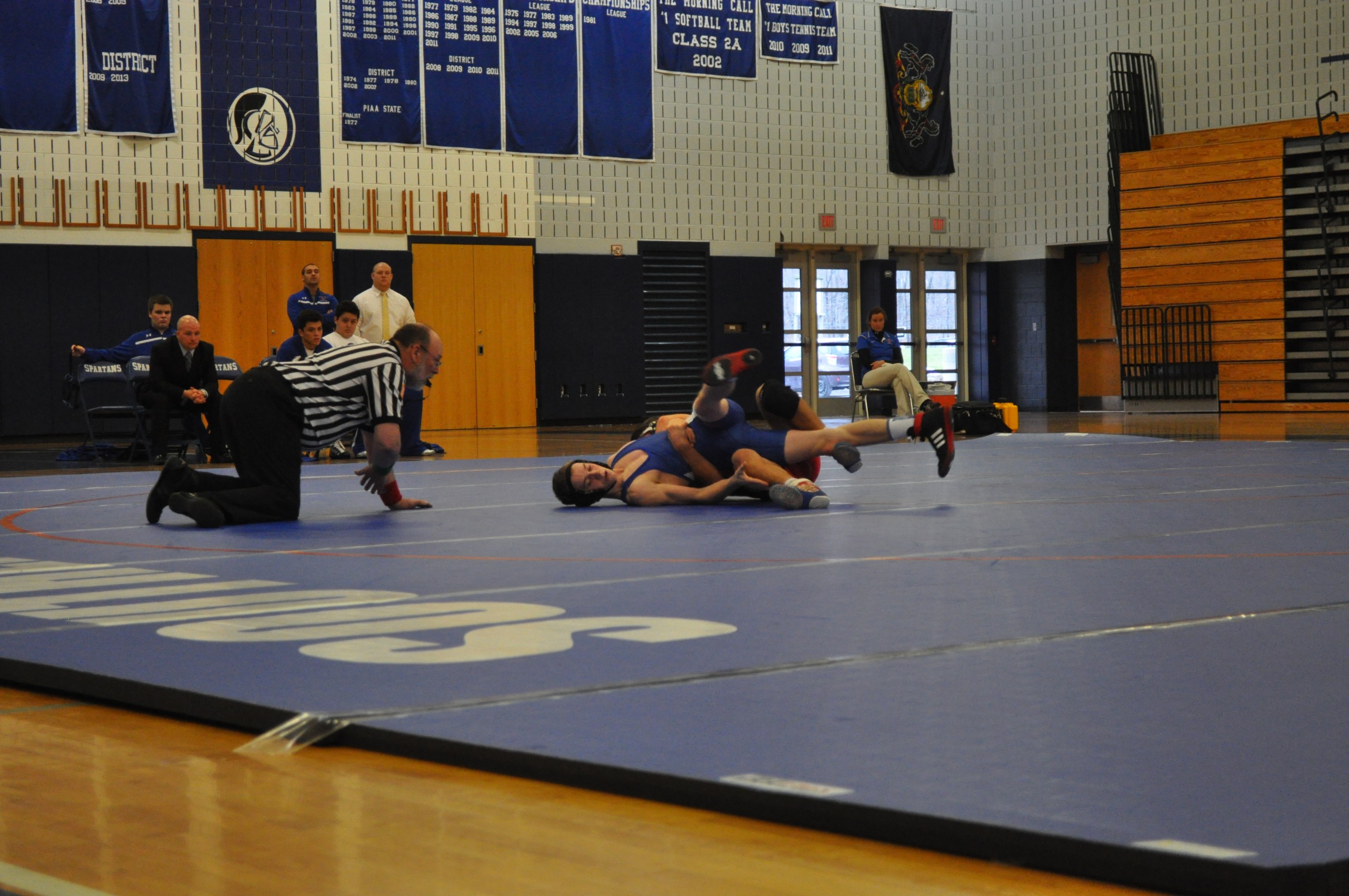 Freshman Angelo Mahaffey pins for Saucon at 120.