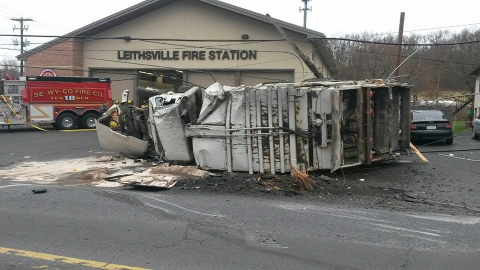 A garbage truck struck a utility pole and rolled over in front of the Leithsville fire station in Lower Saucon Township Dec. 2, closing a busy section of Rt. 412.